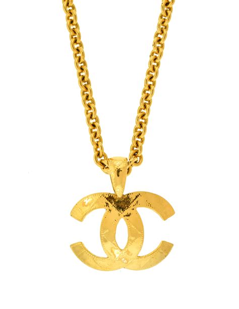 chanel monogram necklace.